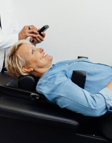 Non-surgical spinal decompression in South Jordan UT relieving back pain, herniated discs, and nerve pressure for improved mobility | Freedom Integrated Medicine